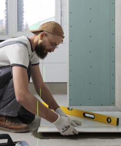 tiler-working-renovation-apartment